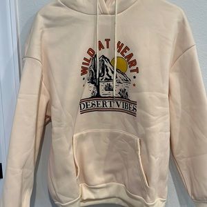 cream sweatshirt